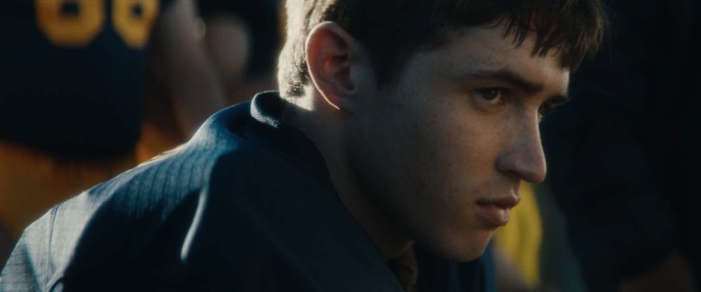 The young Tom Brady looking sad in a football jersey in a short film with postprodction by Adrian Weber