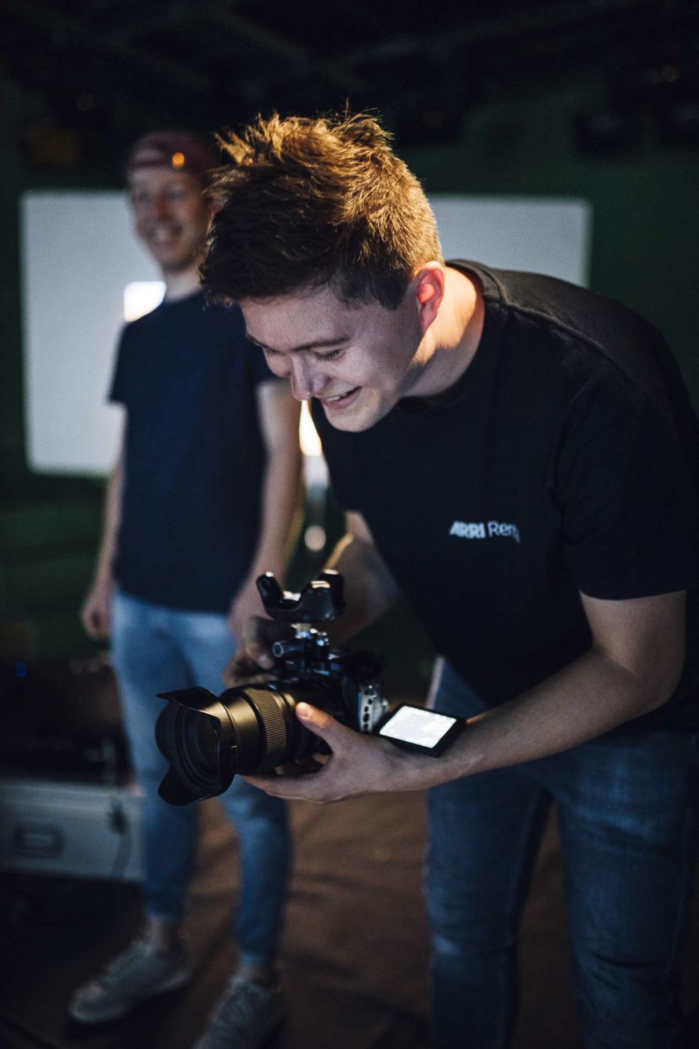 Lauritz Raisch holding a camera with an HTC-Vive Tracker on it.