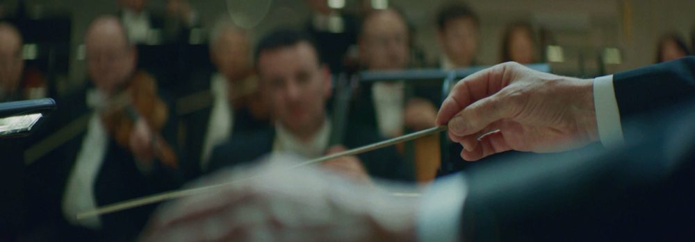 A conductor shortly before starting a piece with the Berner Symphony Orchestra.