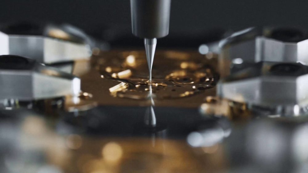 A very fine drill shaping a IWC watch in the factory in Schaffhausen.