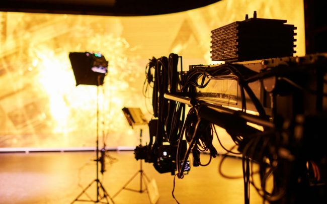 A Technocrane 40 with an ARRI SRH3 and a Sony Venice in front of the LED wall at Halostage, operated by Adrian Weber.