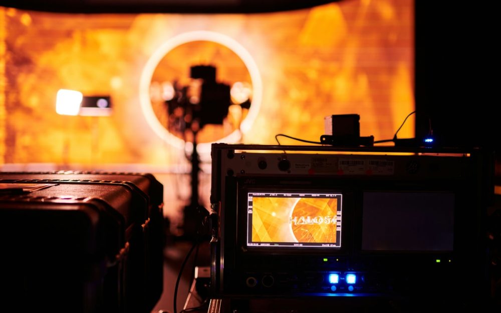 The monitor, setup and camera crane on a filmset setup at Halostage.