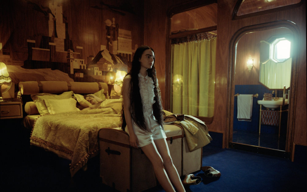 Emma Stone in the sleeping quarters on a ship on the set of