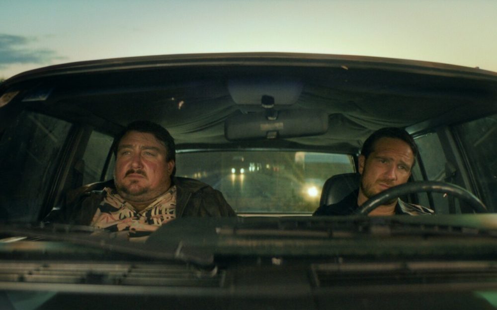 Frederick Lau and Christoph Krutzler in a car on a Highway for the Netflix Series